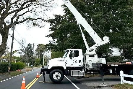 JSK crane truck set up beside a Falmouth road